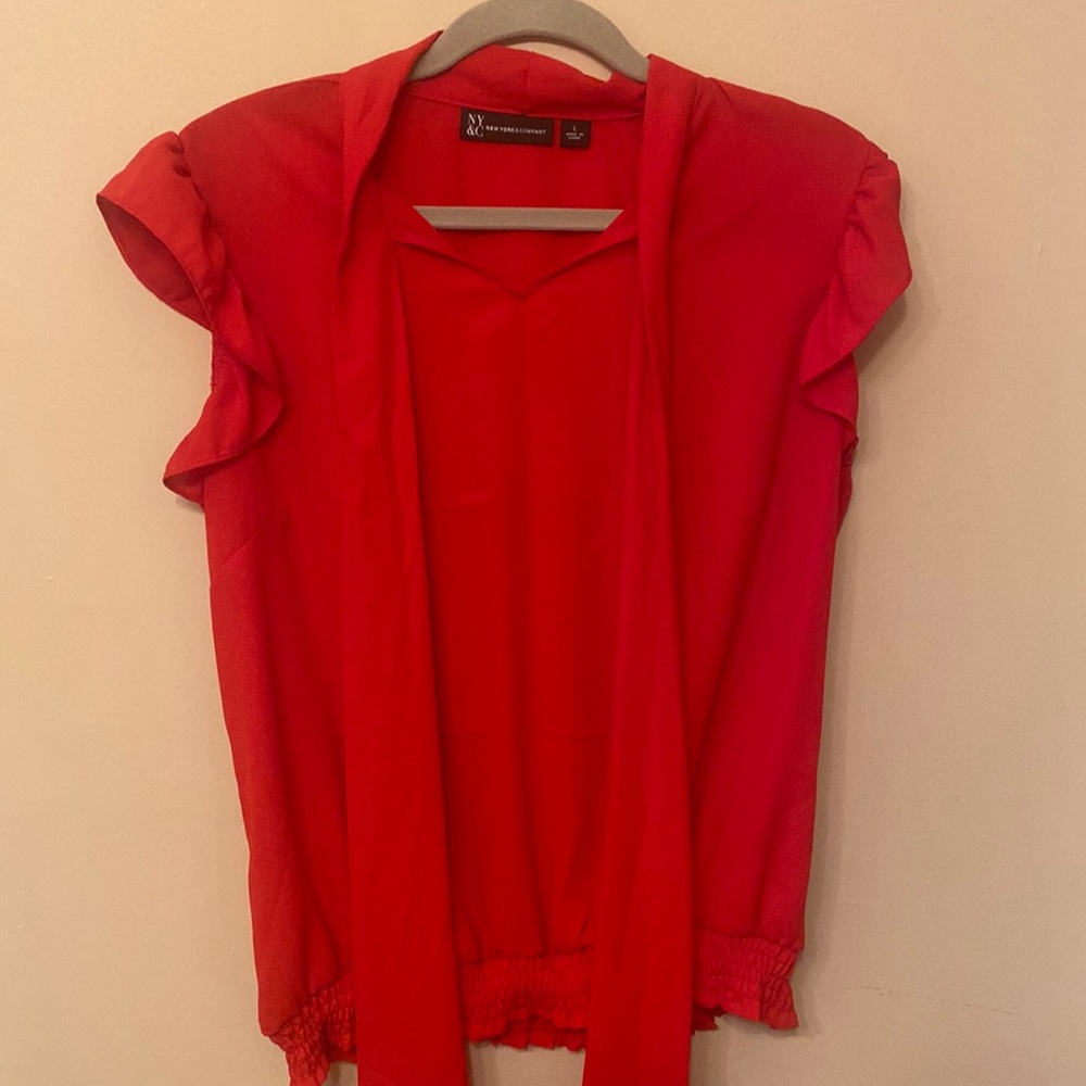 Red v neck blouse with tie